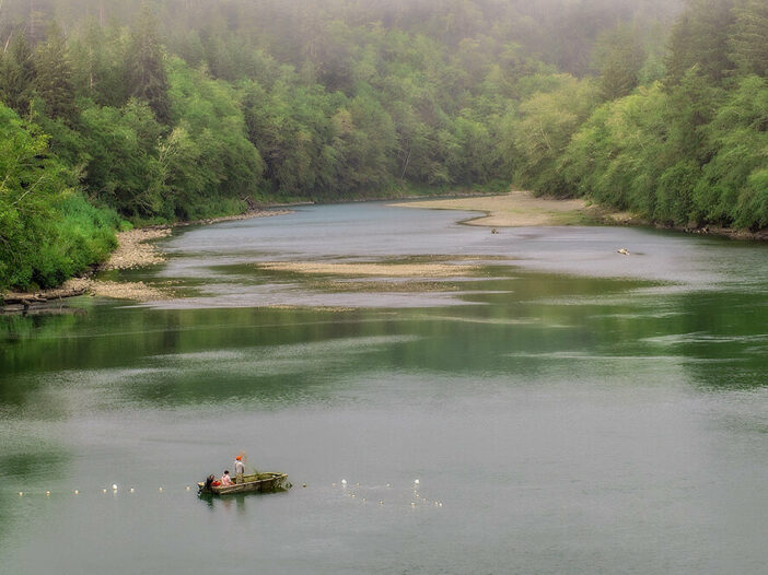 Fishermen fishing in the Queets River